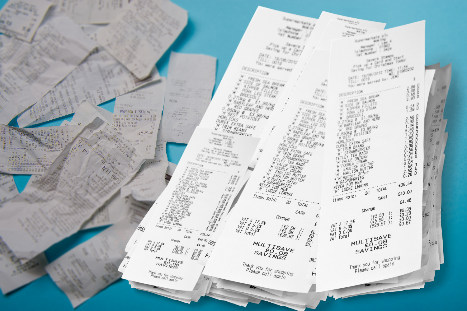 stacks of receipts placed on desktop